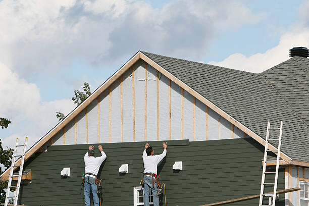 Professional Siding Replacement technician working in Adamsburg, PA
